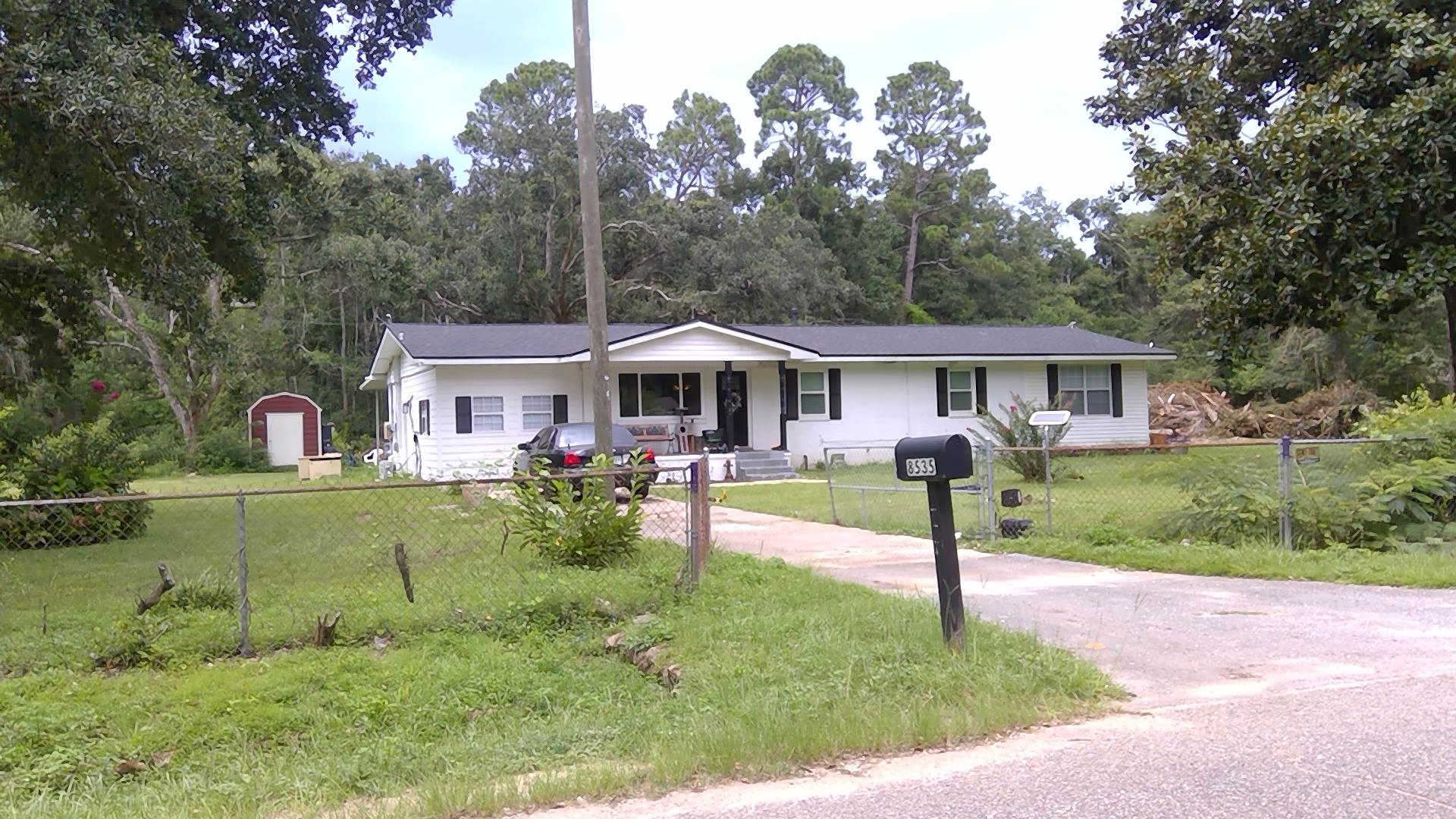 Single family at 8535 COVE AVE, Pensacola FL — foreclosure auction