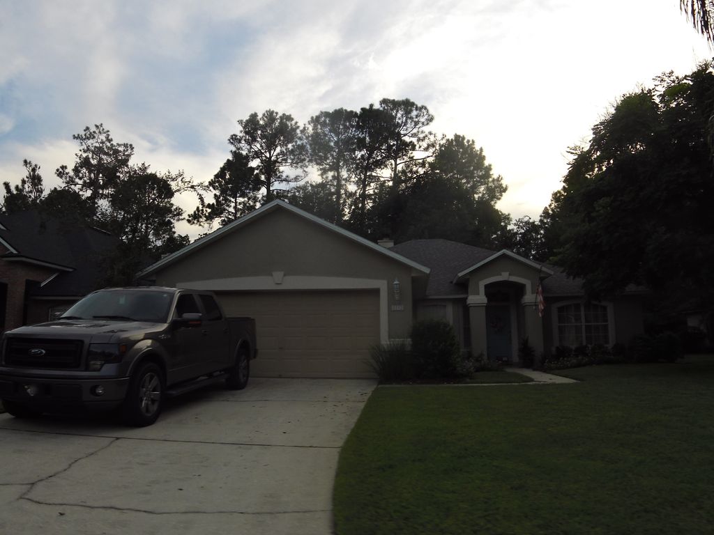 Street-level photo near 8910 CANOPY OAKS DR