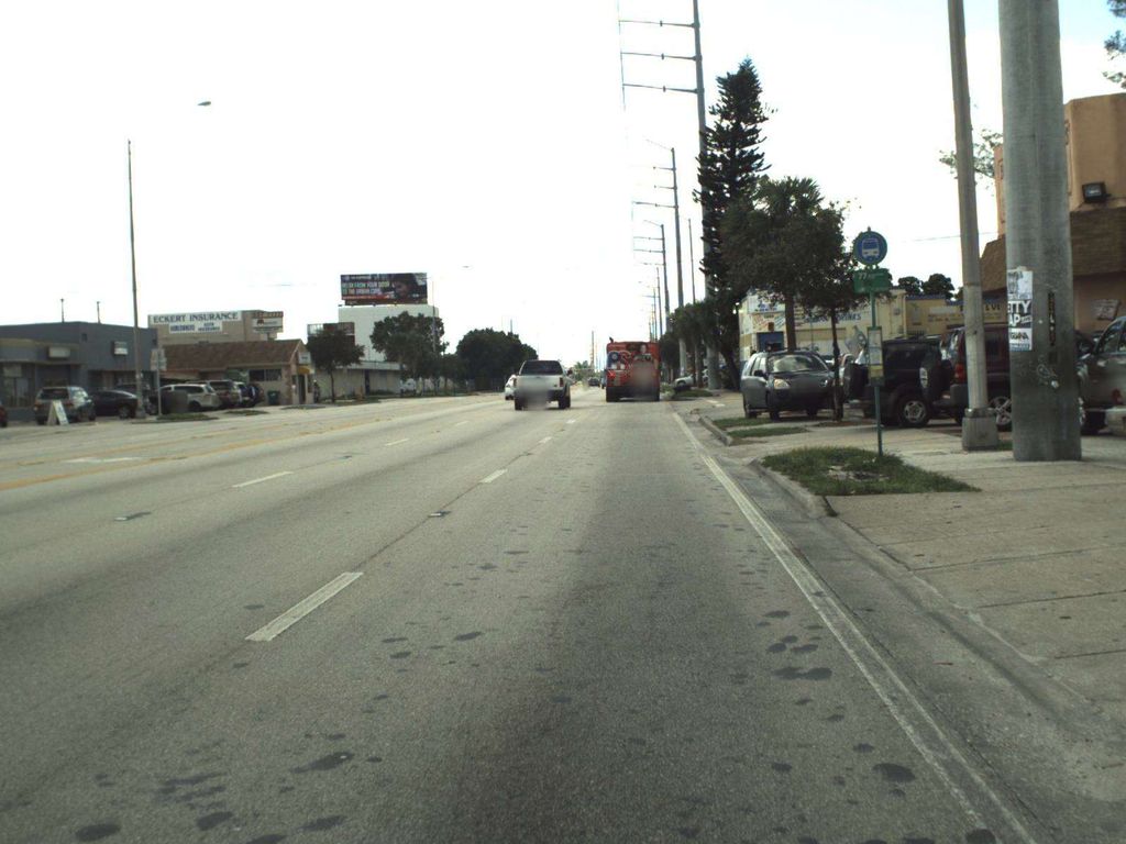 Street-level photo near 11628 NW 7 AVE
