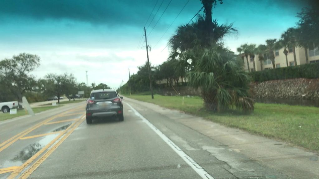 Street-level photo near 15409 BELLAMAR CIR