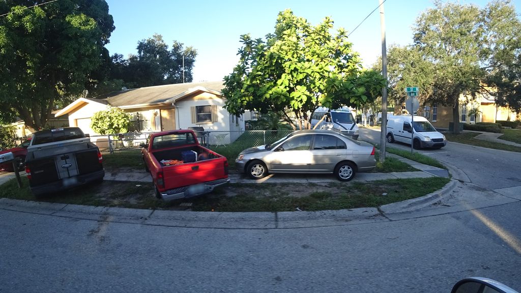 Street-level photo near 521 10TH AVE W