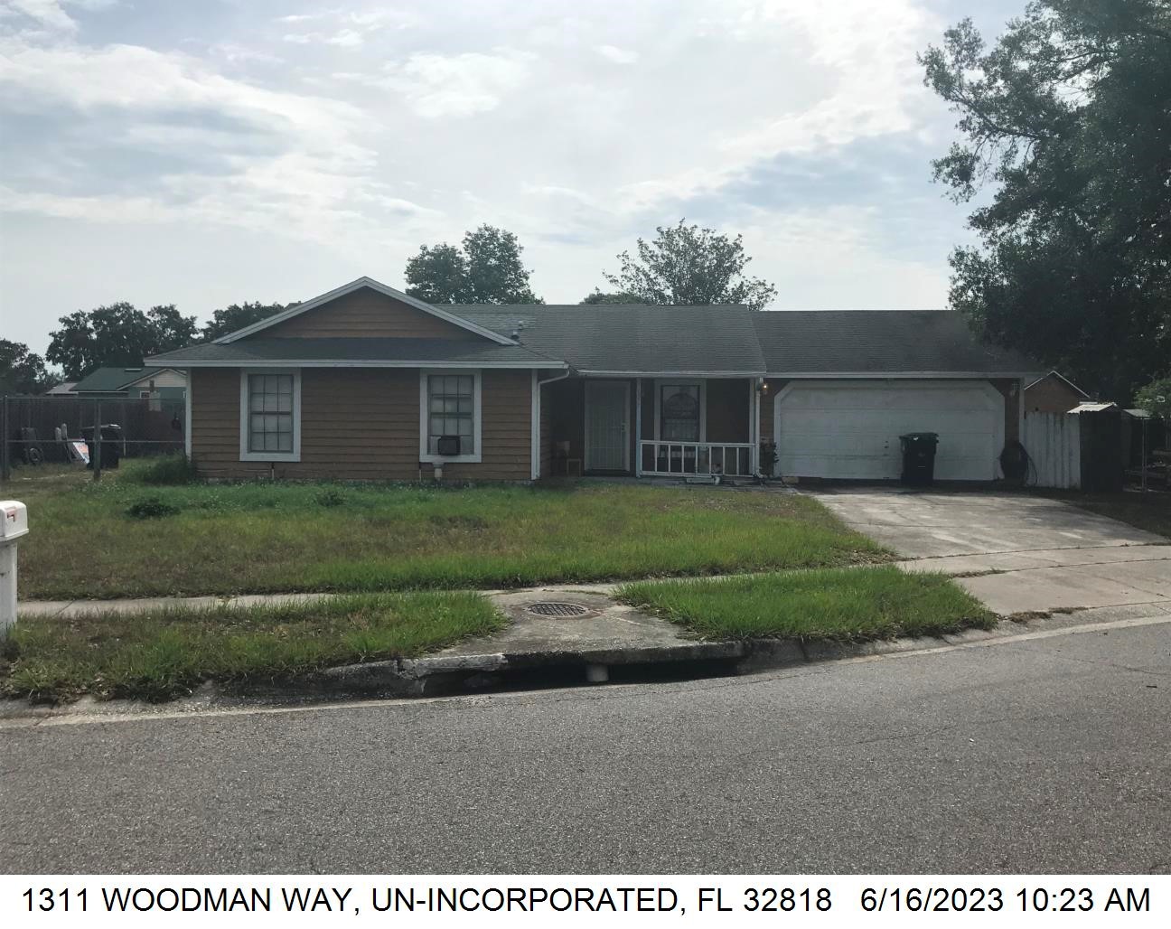 3-bed single family at 1311 WOODMAN WAY, Orange County FL — foreclosure auction