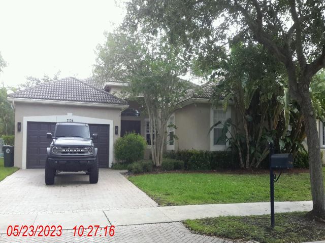 4-bed single family at 7124 NW 47 LANE, Coconut Creek FL — foreclosure auction