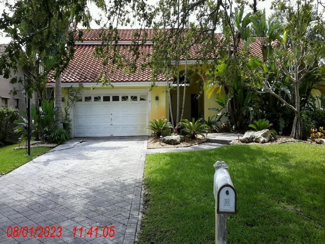 4977 NW 97 DRIVE, CORAL SPRINGS FL