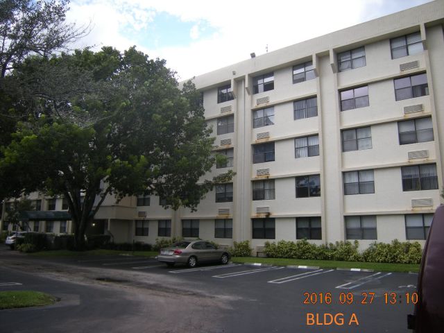 1-bed single family at 2501 RIVERSIDE DRIVE #406-A, Coral Springs FL — foreclosure auction