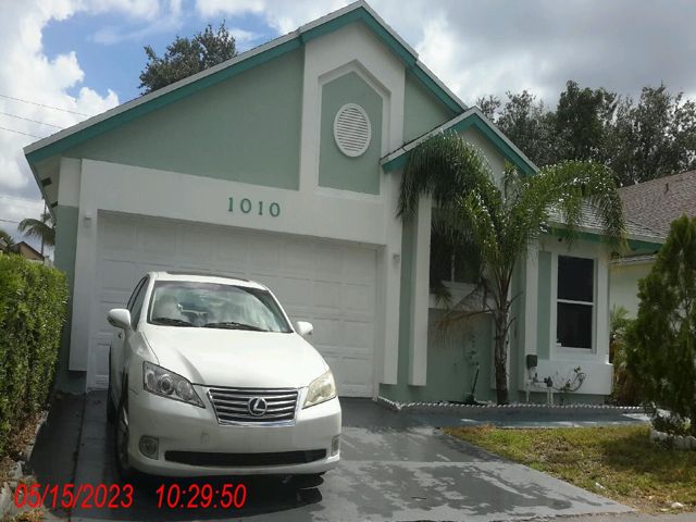 3-bed single family at 1010 W JASMINE LANE, North Lauderdale FL — foreclosure auction