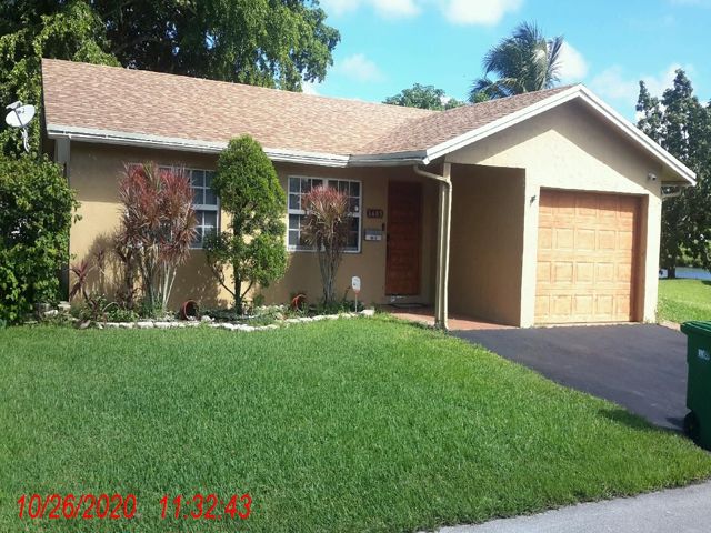 2-bed single family at 6605 NW 77 STREET, Tamarac FL — foreclosure auction