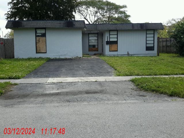 Single family at 7804 NW 68 TERRACE, Tamarac FL — foreclosure auction