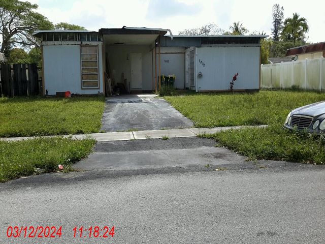 2-bed single family at 7802 NW 68 TERRACE, Tamarac FL — foreclosure auction