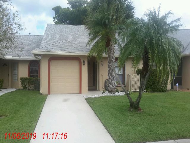 2-bed single family at 9735 NW 76 STREET, Tamarac FL — foreclosure auction