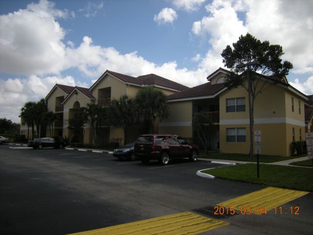 2-bed single family at 7640 WESTWOOD DRIVE #420, Tamarac FL — foreclosure auction