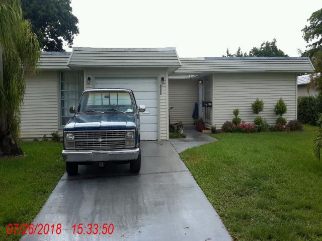 2-bed single family at 6303 NW 73 AVENUE, Tamarac FL — foreclosure auction