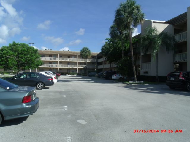 1-bed single family at 6150 NW 62 STREET #108, Tamarac FL — foreclosure auction