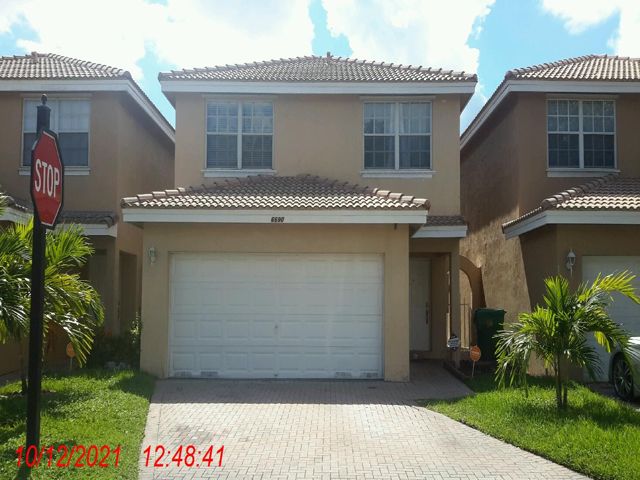 6690 NW 38 DRIVE, LAUDERHILL FL