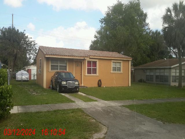 Single family at 870 NW 34 TERRACE, Lauderhill FL — foreclosure auction