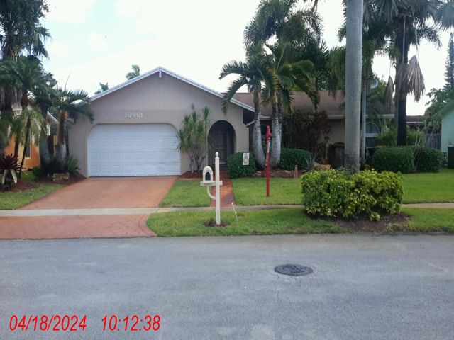 3-bed single family at 10961 NW 16 COURT, Pembroke Pines FL — foreclosure auction