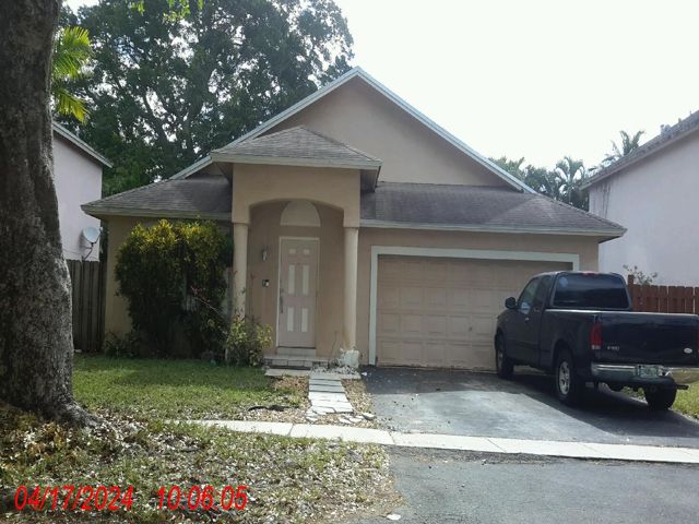 4-bed single family at 1521 SW 97 AVENUE, Pembroke Pines FL — foreclosure auction