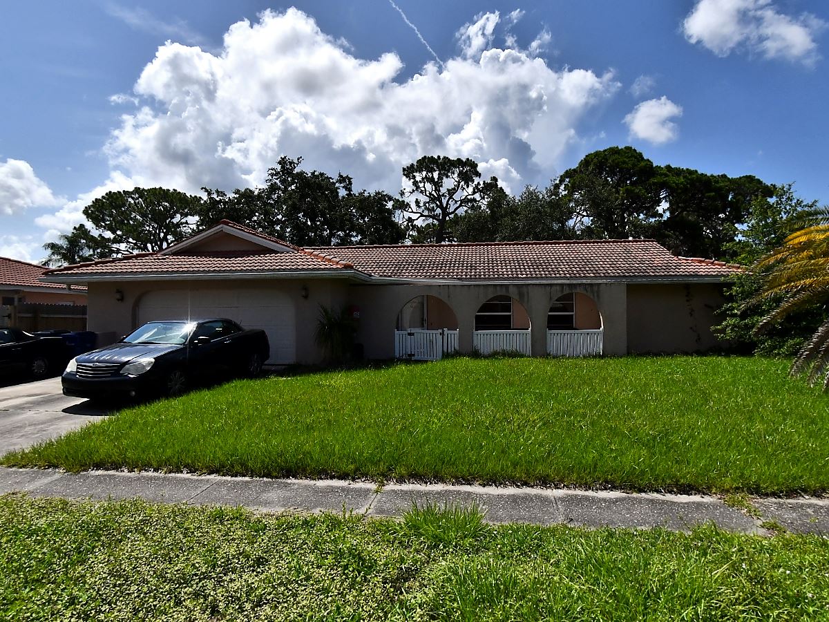4-bed single family at 7447 DICKENS DR, Sarasota County FL — foreclosure auction