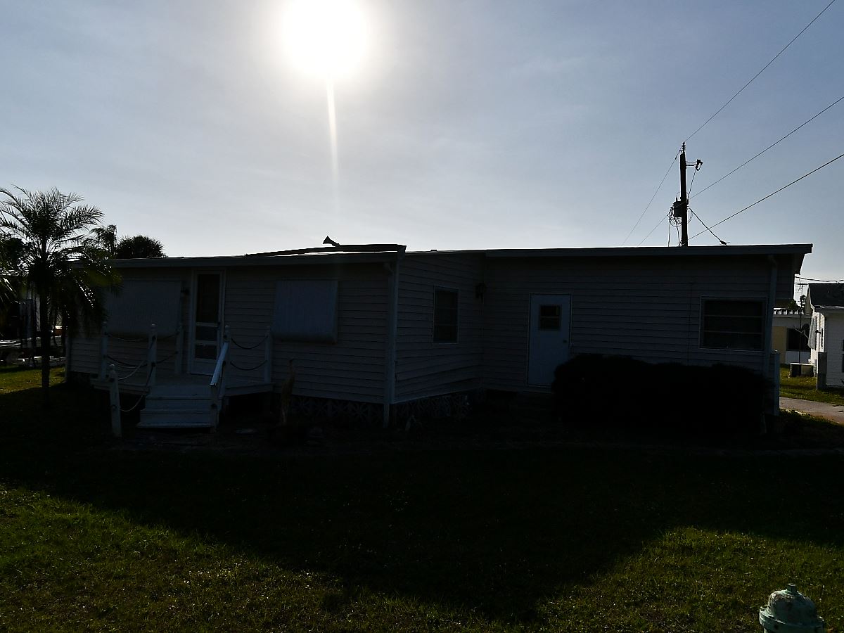2-bed single family at 1891 ENGLEWOOD RD 94, Sarasota County FL — foreclosure auction