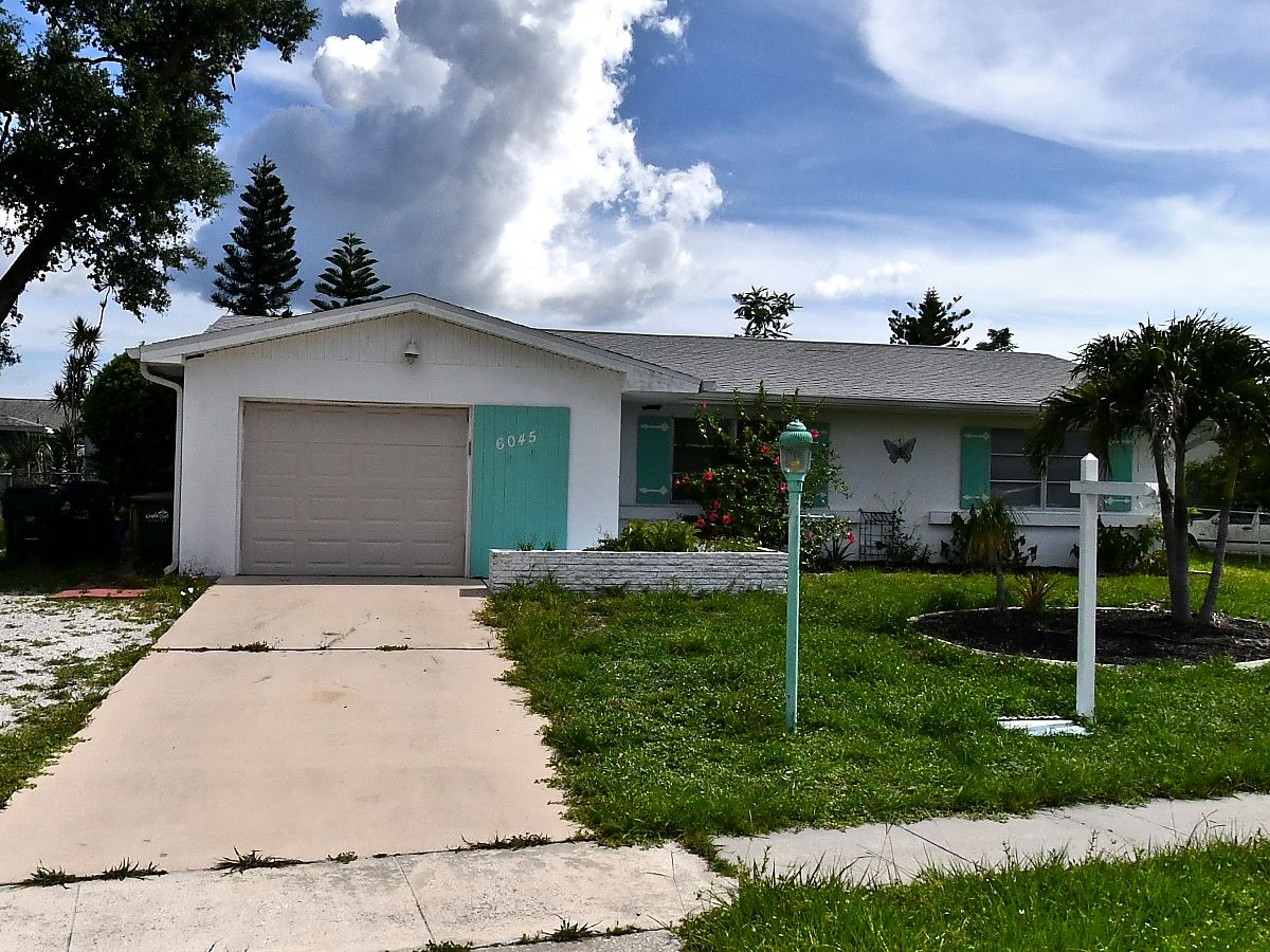 2-bed single family at 6045 SLADE RD, Sarasota County FL — foreclosure auction